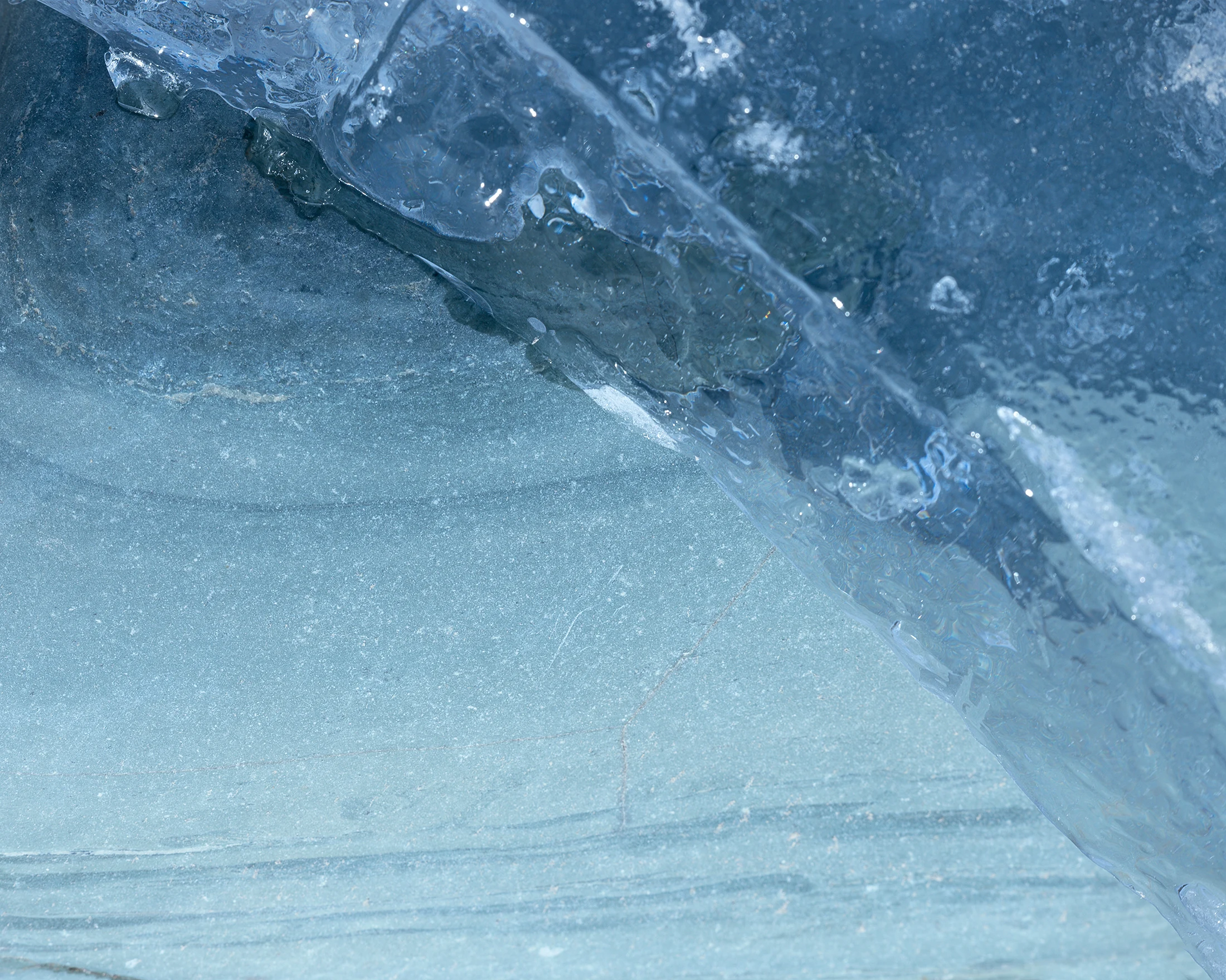 Abstract blue ice crack and frozen texture.