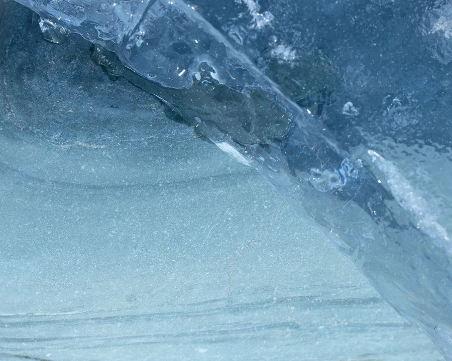 Abstract blue ice crack and frozen texture.