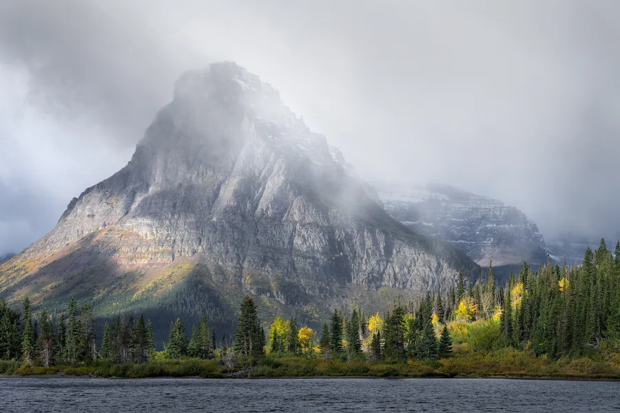 A mountain lake beneath rugged peaks.