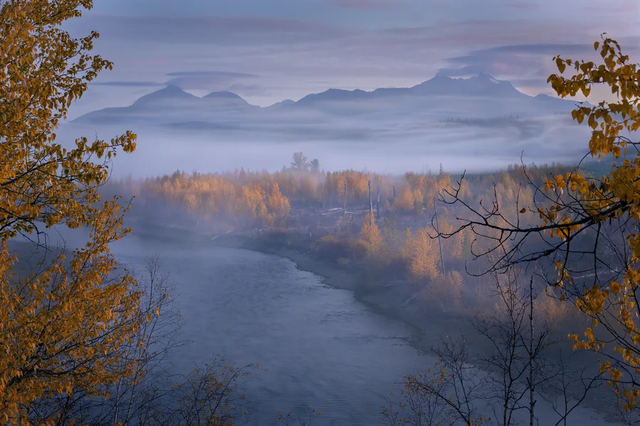A mountain lake beneath rugged peaks.